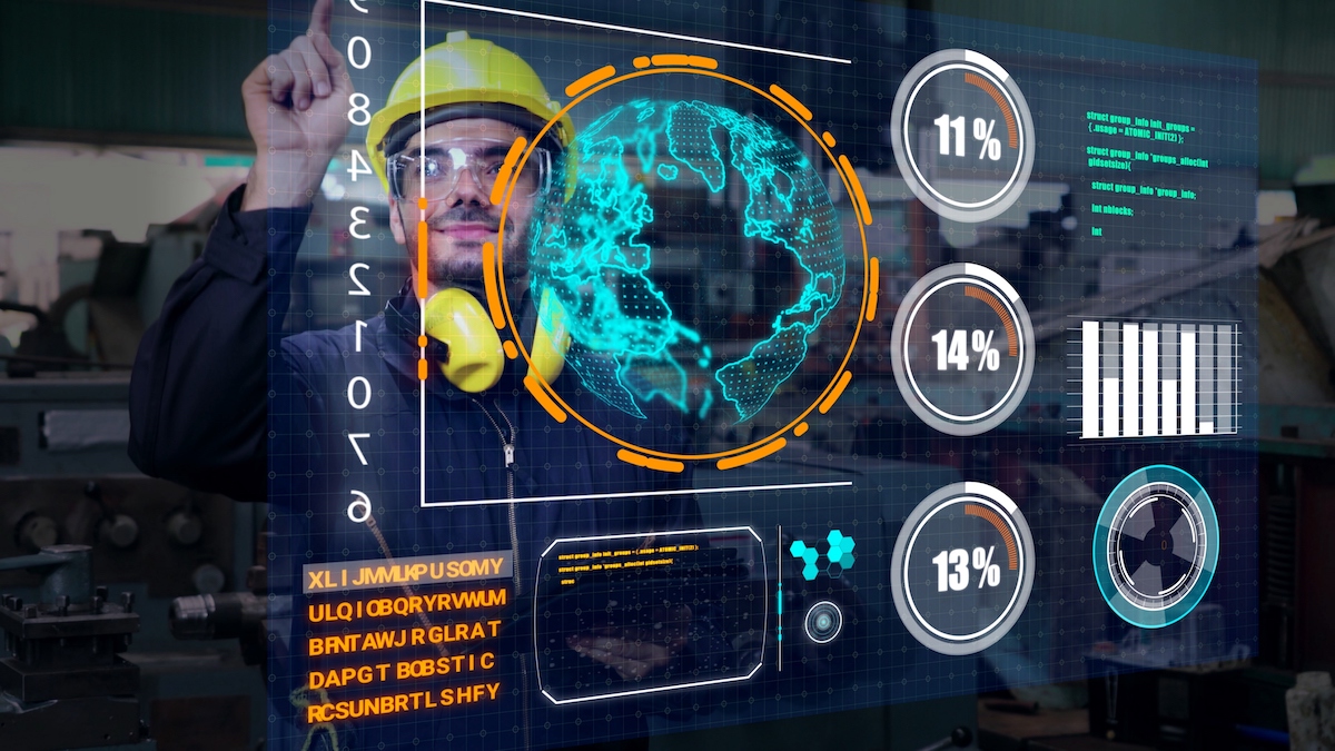Factory worker use future holographic screen device to control manufacturing