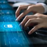 Technology concept with cyber security internet and networking, Businessman hand working on laptop, screen padlock icon on digital display.