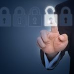 businessman-unlocking-a-lock-on-the-touch-screen