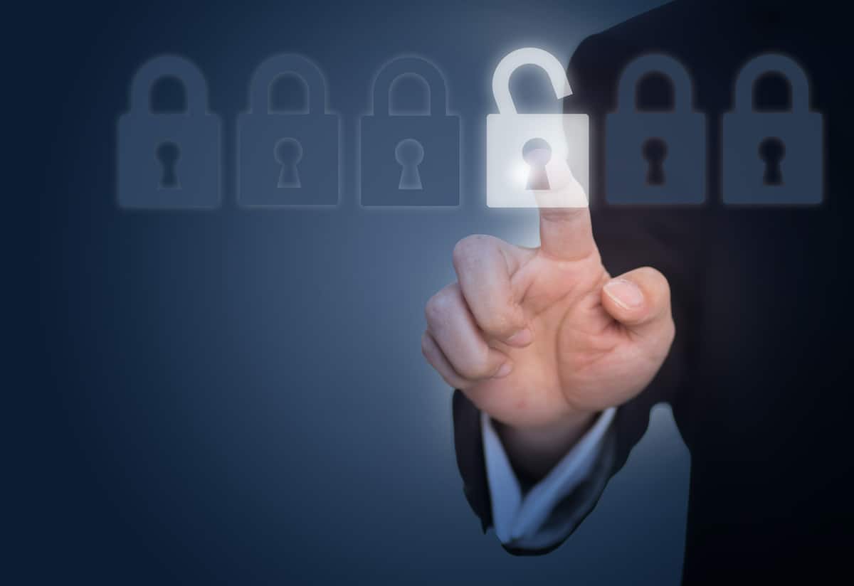 businessman-unlocking-a-lock-on-the-touch-screen