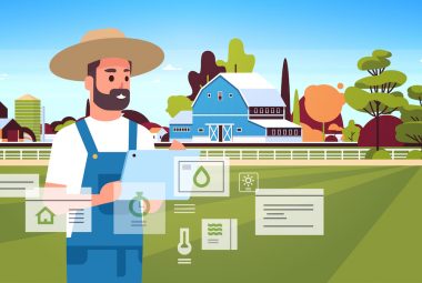 man farmer with tablet monitoring condition controlling agricultural products organization of harvesting smart farming concept farm building landscape background flat horizontal portrait