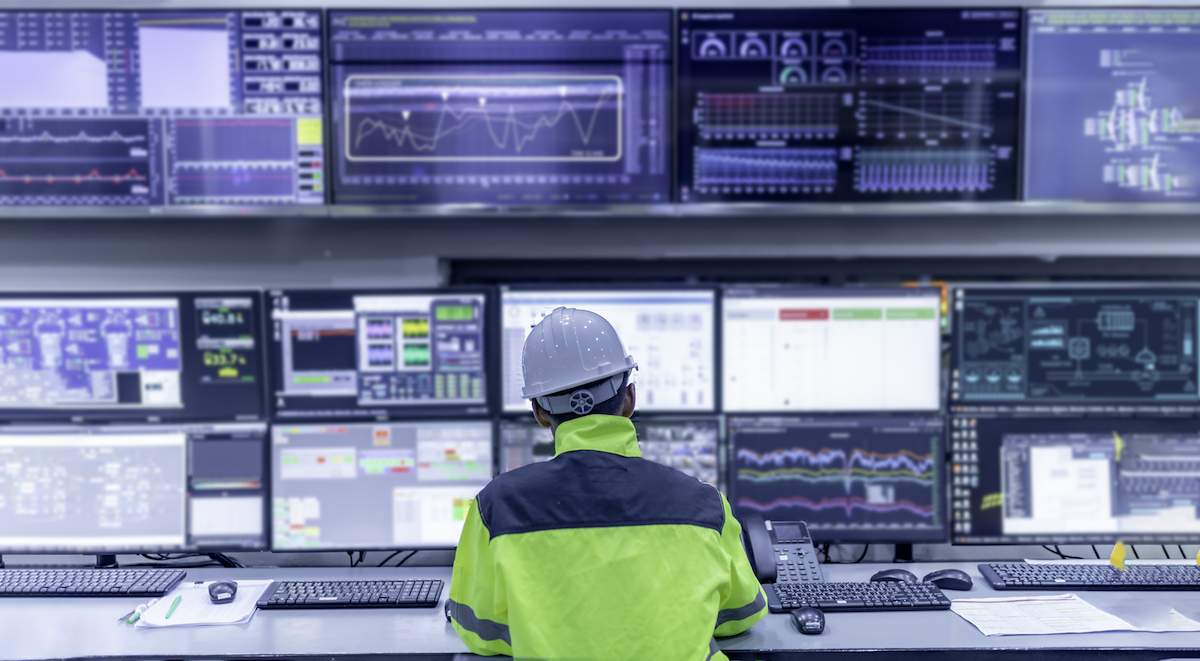 engineer-working-control-roommanager-control-systemtechnician-man-monitoring-program-from-lot-monitor